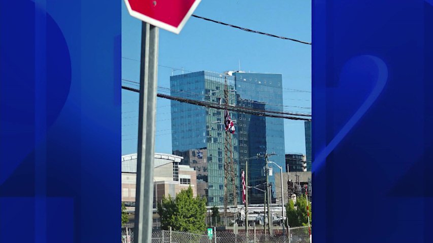 Video thumbnail for American flag from WWE building knocks out power to thousands