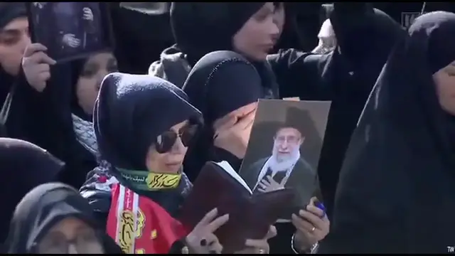Video thumbnail for Iran: Mourners Flock to Imam Khomeini Prayer Hall for Funeral Tribute.