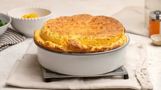 'Video thumbnail for This Cheesy Corn Souffle Recipe Belongs In Your Bookmarks'