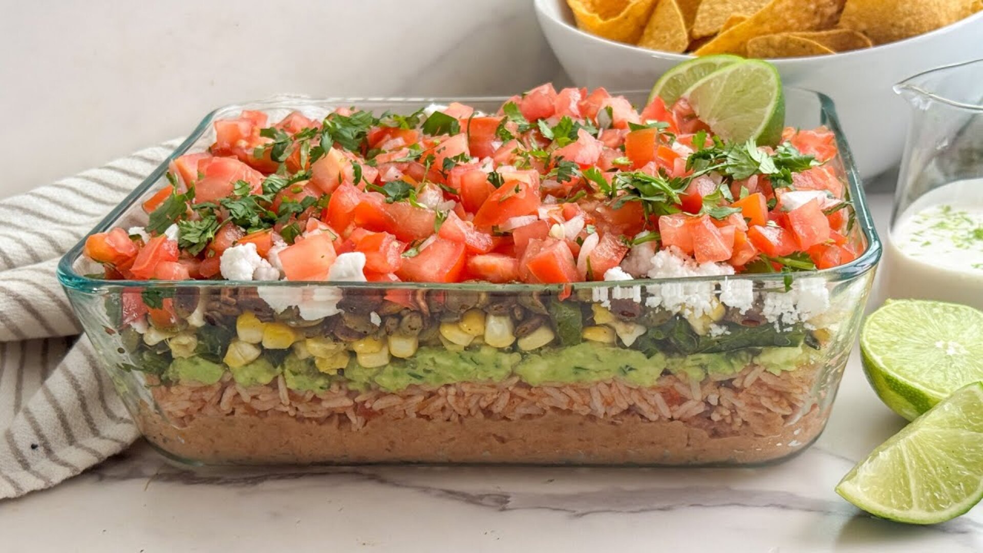 Video thumbnail for Our Elevated 7-Layer Dip Recipe Will Be The Talk Of The Party