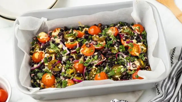 'Video thumbnail for Loaded Cauliflower Nachos Recipe'