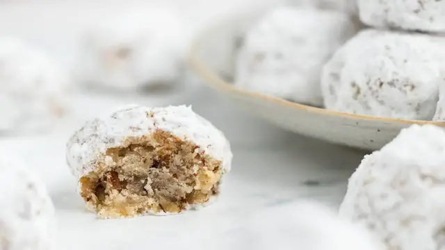 Video thumbnail for Melt-In-Your-Mouth Mexican Wedding Cookies Recipe