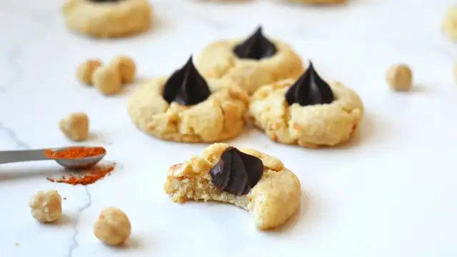 'Video thumbnail for Chile Chocolate Hazelnut Thumbprint Cookies Recipe'