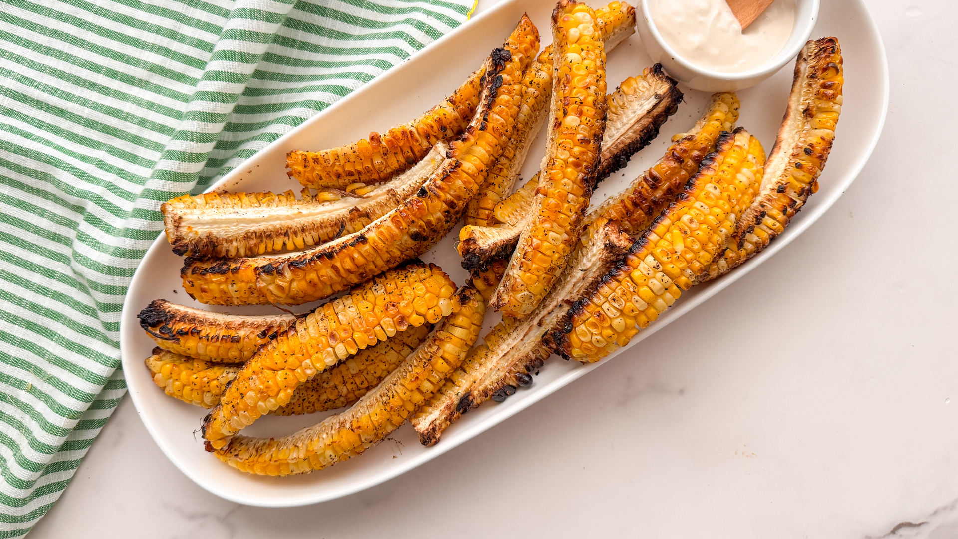 Video thumbnail for Crab Boil-Inspired Corn Ribs Recipe