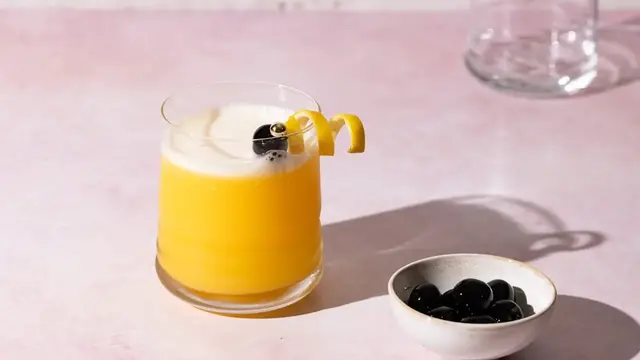 Video thumbnail for No-ABV Amaretto Sour Mocktail Recipe
