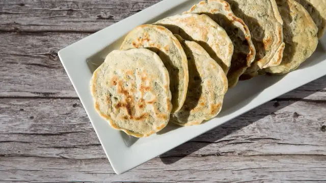 Video thumbnail for Kremydotiganites (Greek Savory Pancakes) Recipe