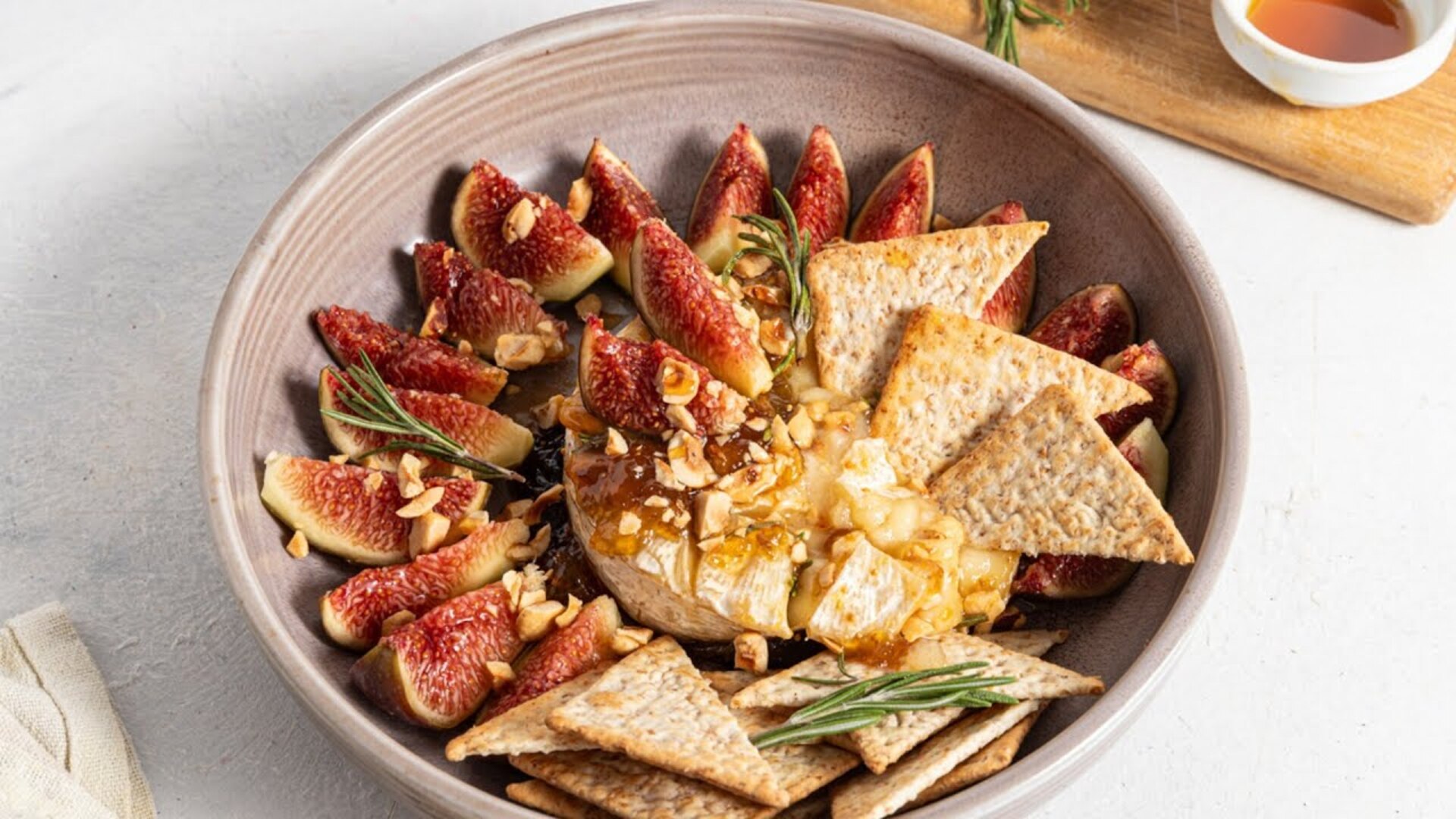 Video thumbnail for Hazelnut And Fig Baked Brie Recipe