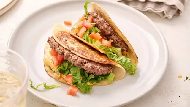 Video thumbnail for Cheesy Smash Burger Tacos Recipe