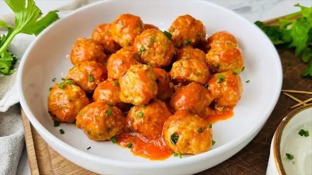 'Video thumbnail for Buffalo Chicken And Gorgonzola Meatballs Are Packed With Tangy Heat'