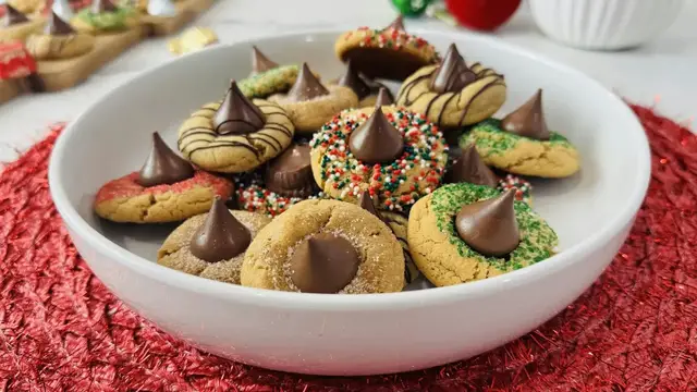 Video thumbnail for Festive Peanut Butter Blossom Cookies Recipe