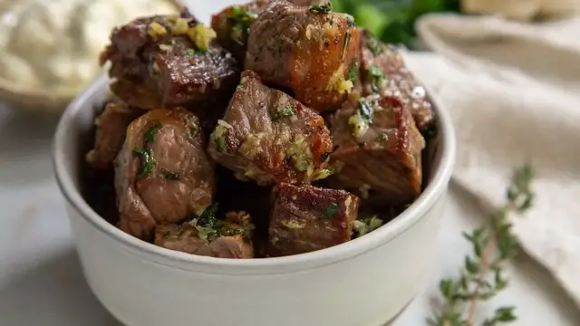 'Video thumbnail for Garlic And Herb Air Fryer Steak Bites Recipe'