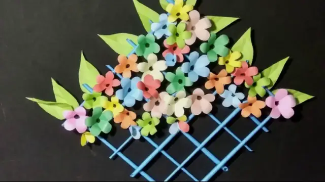 Video thumbnail for Kaagaz ke Phool | Kagojer Ful | How to make DIY Paper Flower Wallmet | Tubelife