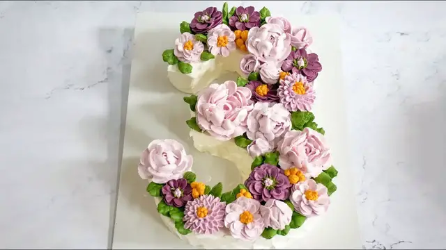 'Video thumbnail for Beautiful flowers in number 3 birthday cake decoration | Délicieux Pie | Shot on iPhone'