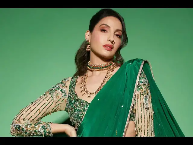 'Video thumbnail for Nora Fatehi Mesmerizing Charm Shines in Exquisite Green Traditional Saree'