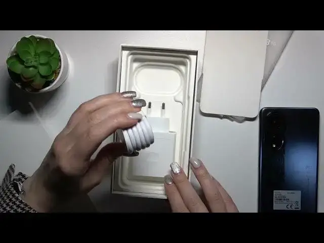 Video thumbnail for Checking for Earbuds - OPPO A98 & Accessories in the Set