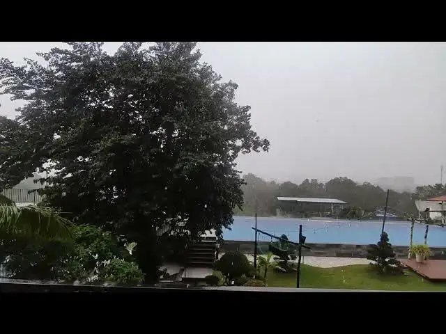 Video thumbnail for Tropical Rain Over Infinity Pool | Hilltop Resort View