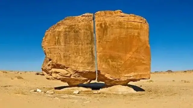 Video thumbnail for The 4,000-year-old Al Naslaa Rock Formation Has A Mystery Laser-like Cut Through Its Center - History & Travel