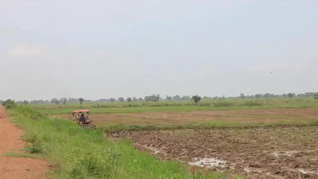 'Video thumbnail for The Famer drive tractor to plough soil'