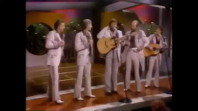 Video thumbnail for Glen Campbell with The Statler Brothers - Flowers on the Wall (1982)