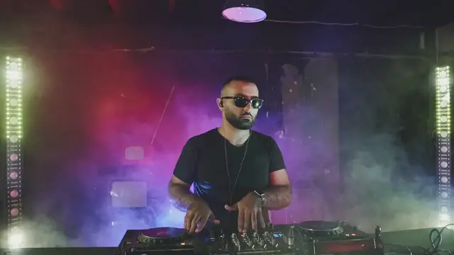'Video thumbnail for DJ Playing in Front of People with Sunglasses On'