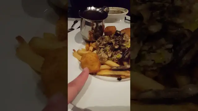'Video thumbnail for Deep Fried Cheese Curds in a Poutine @ Cafe du Monde'