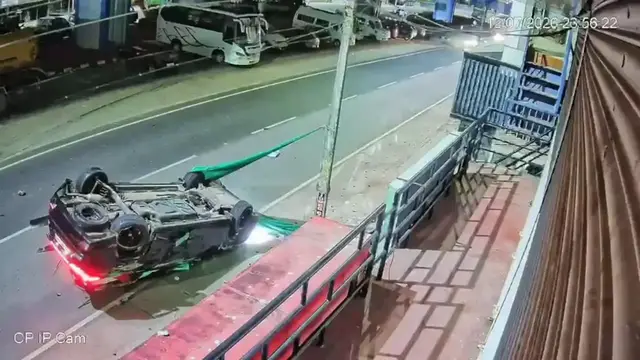 Video thumbnail for India: Speeding Car Flips Onto Roof in Dramatic Night Crash in Kerala's Kasaragod; Airbags Help Occupants Escape Serious