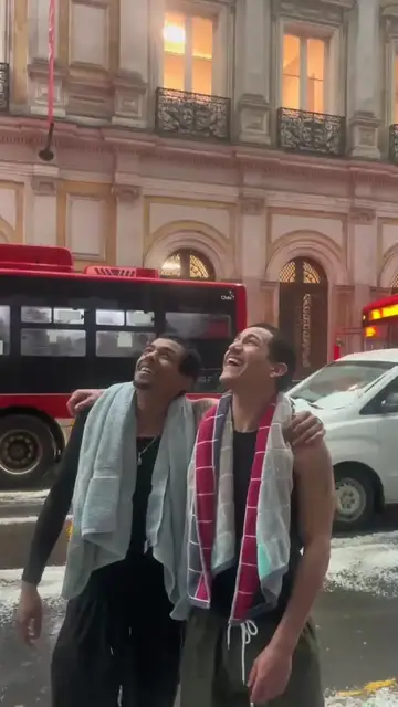 Video thumbnail for Friends Turning a City Hailstorm into Winter Magic