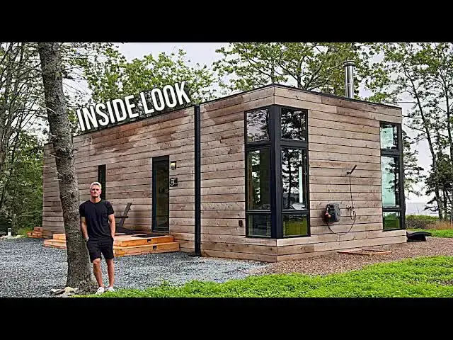 'Video thumbnail for kerry tarnow: explore the brooklyn shore lodge: a prefab cabin tour, interior & exterior design!'