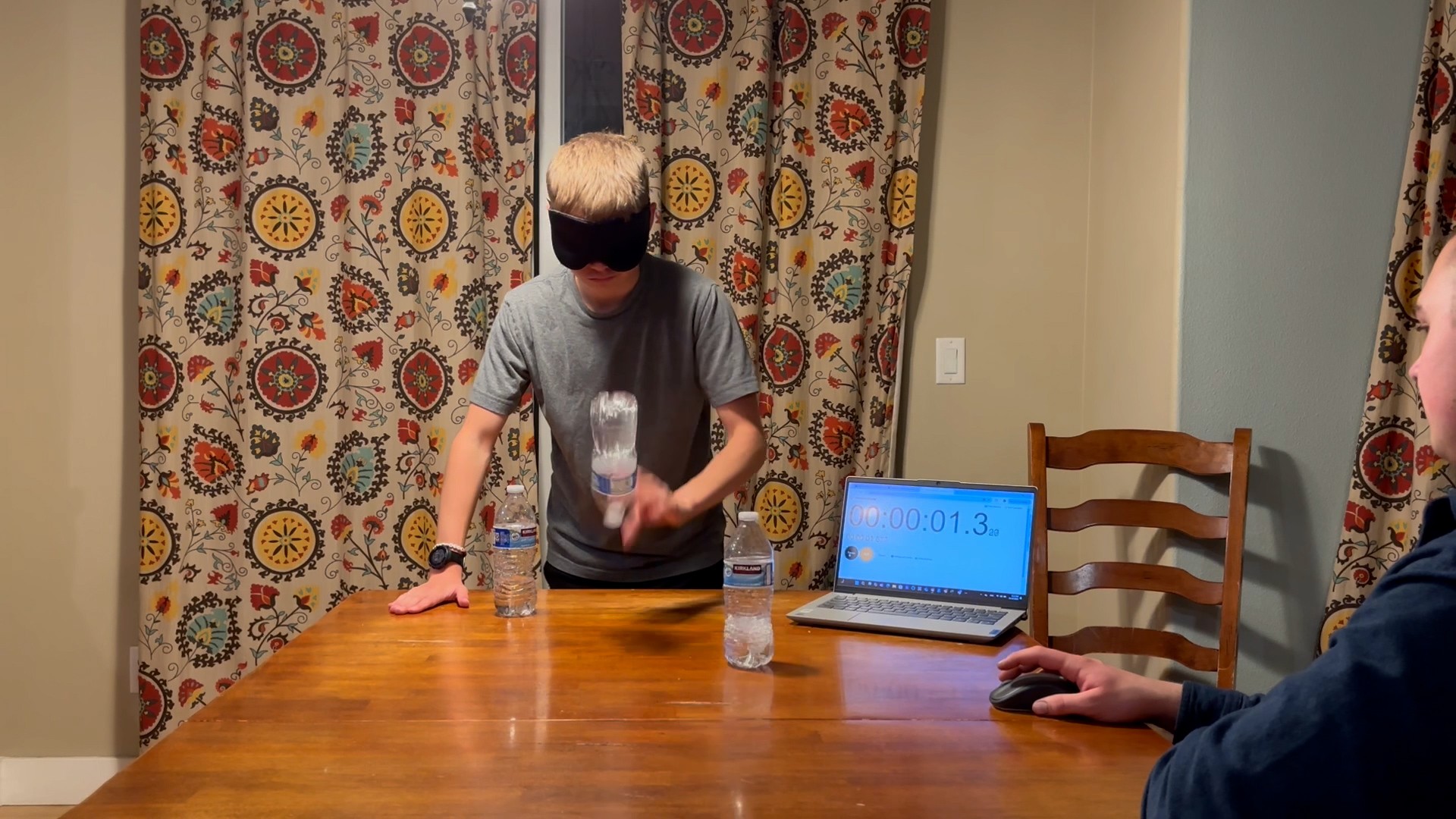 Video thumbnail for Fastest time to flip three water bottles blindfolded - 2.56 seconds by Spencer Shaw