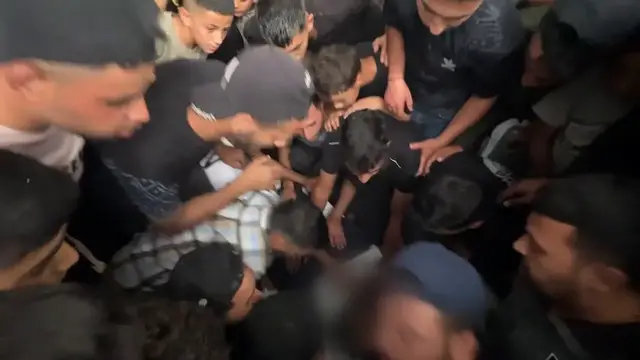 Video thumbnail for Relatives bid farewell to journalist killed in Israeli attack on Gaza (3).