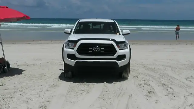 'Video thumbnail for Driving 4x4 on Florida Beach Sand'