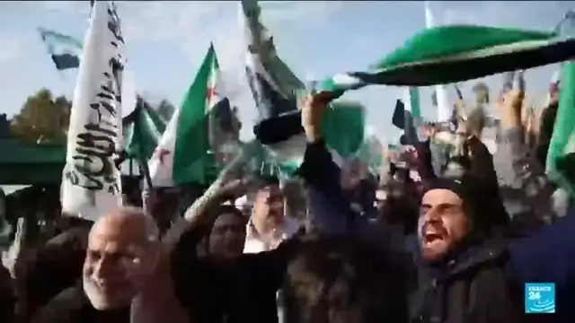 Video thumbnail for Syrians celebrate as one year anniversary of Bashar al-Assad's fall approaches