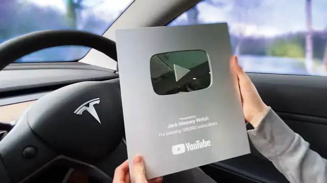 'Video thumbnail for Unboxing my 100,000 subscribers YT award in my Tesla Model 3!'