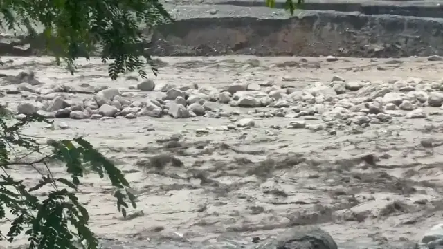 Video thumbnail for Nepal: Silt chokes river, buildings destroyed in Nepal's Rasuwa after deadly flash floods.