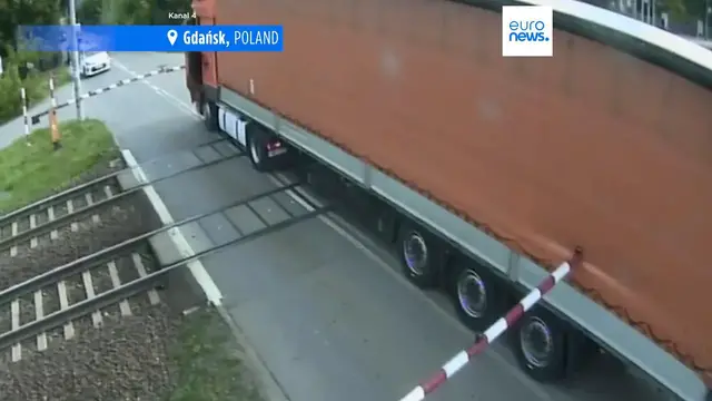 Video thumbnail for Lorry driver's botched escape attempts fail to outrun oncoming Polish train