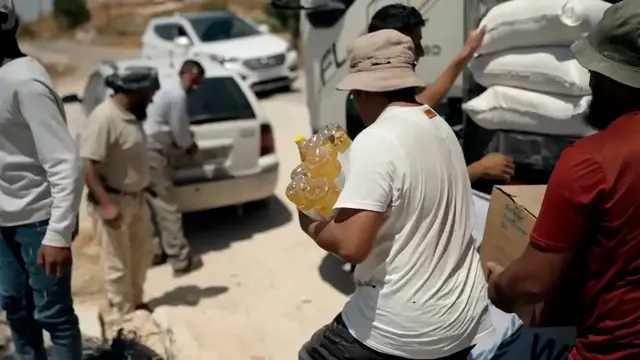 Video thumbnail for UN food agency cuts aid in West Bank amid funding crisis