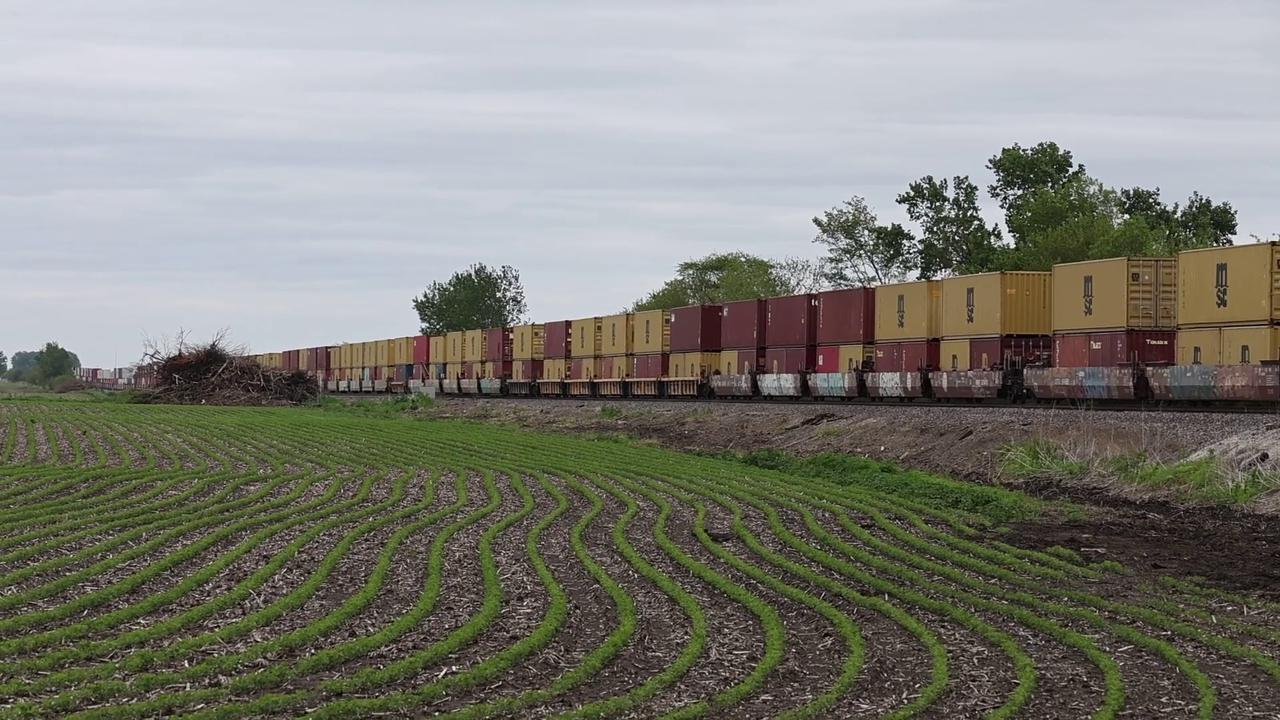 Video thumbnail for US: BNSF Intermodal Freight Train Passing Rural Cornfields   Rutland, Illinois.
