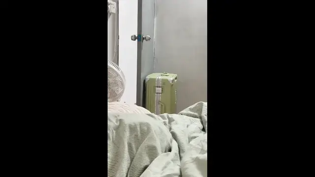 Video thumbnail for Cat Kicks Door Open and Moves Suitcase in Guangdong Home