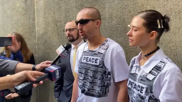 Video thumbnail for USA: Russian rooftoppers in court after scaling NYC's Empire State Building.