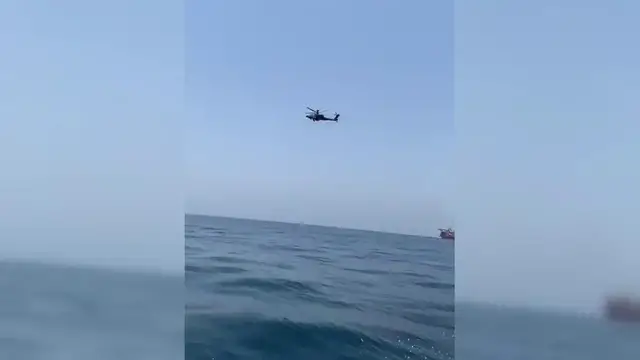 Video thumbnail for Iran: U.S. Apache Helicopter Spotted Over Iranian Fishing Boats.