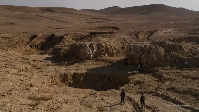 'Video thumbnail for 'A crime that shocks the mind': Iraq exhumes mass grave site left by ISIS'