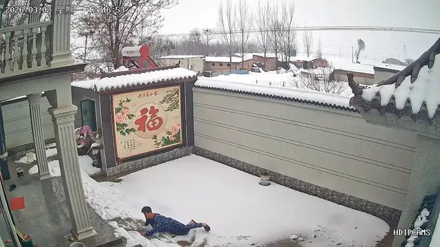 Video thumbnail for Man Takes a Tumble on Icy Front Step in China