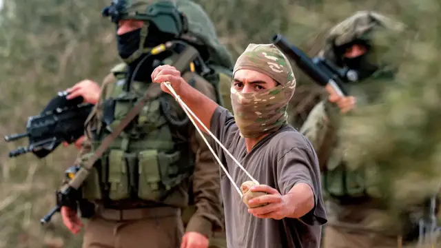 'Video thumbnail for Israeli settlers brutally attack Palestinians, activists, and journalists in West Bank'