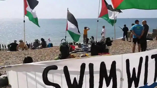 Video thumbnail for UK: Swim With Gaza Event Held on Beach in Brighton and Hove.