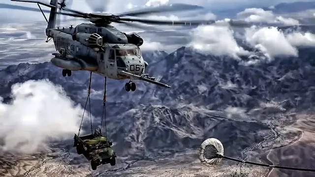 'Video thumbnail for CH-53E Helicopter Inflight Refueling While Hauling A Hummer'