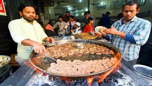 'Video thumbnail for Muslim Street Food in INDIA - TUNDAY KEBAB + MUGHLAI Food in Lucknow!! CRAZY Indian Street Food'