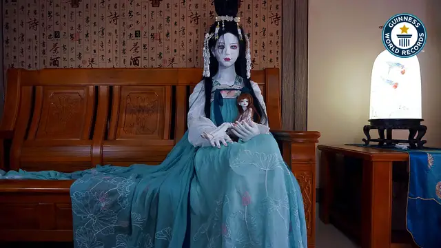 Video thumbnail for The at of elegance, unveiling a life-size porcelain doll