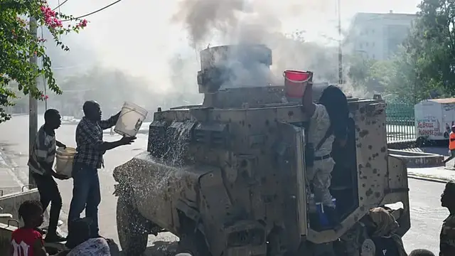 Video thumbnail for Kenyan police unit comes under fire in Port-au-Prince