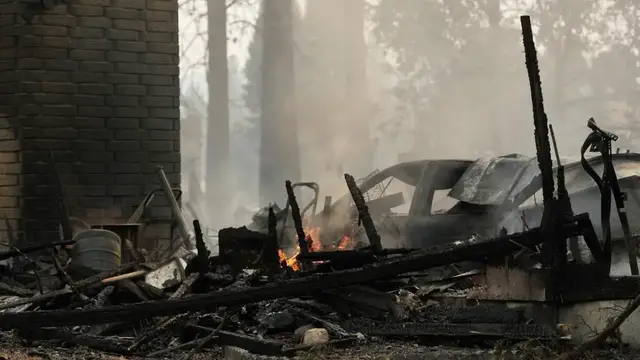 Video thumbnail for Arson suspected in devastating US wildfire that forced 60,000 to evacuate