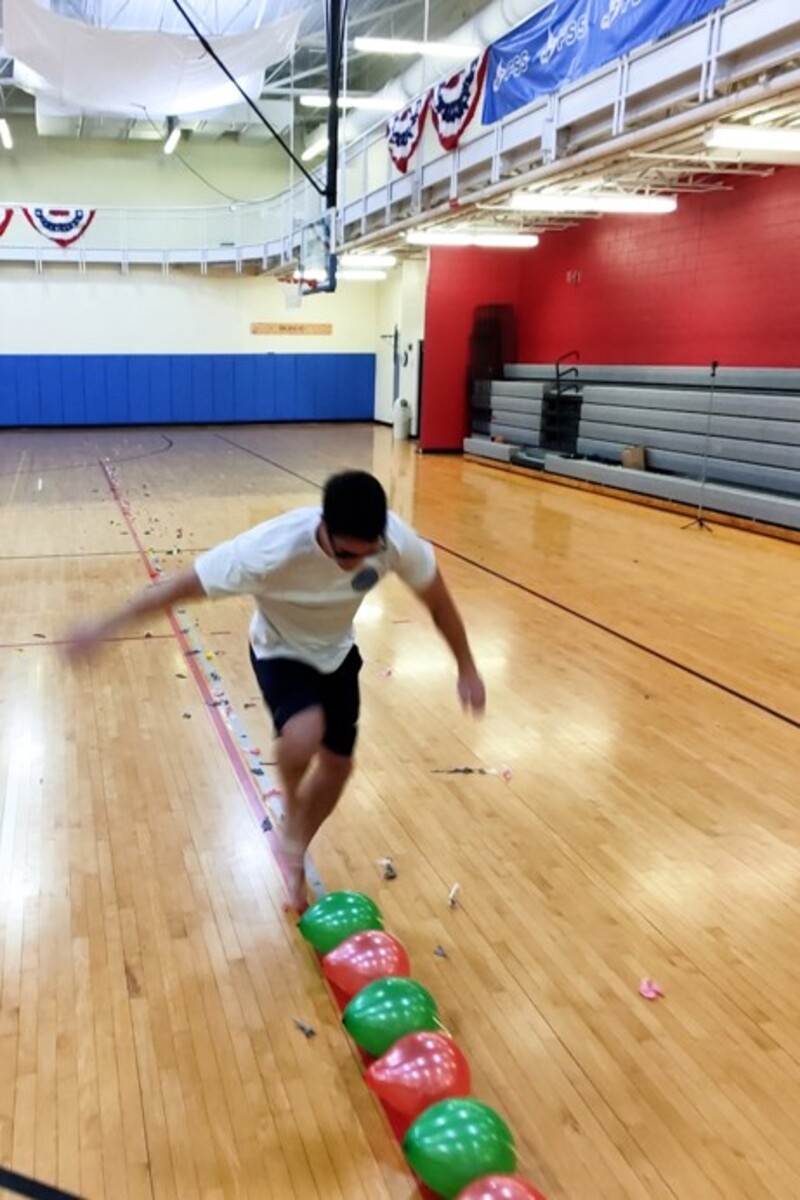 Video thumbnail for Fastest time to pop 100 balloons with the feet  19.78 seconds by Johnny Buckingham
